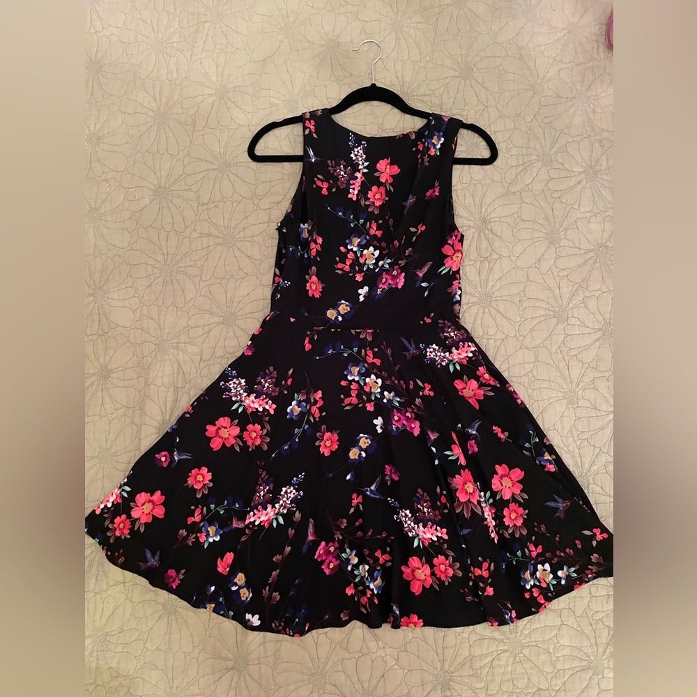 Floral dress, high neckline and modest length
